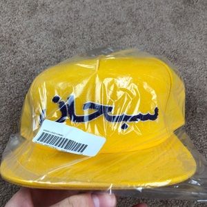 Supreme FW21 Arabic Logo 5-Panel Gold & Purple